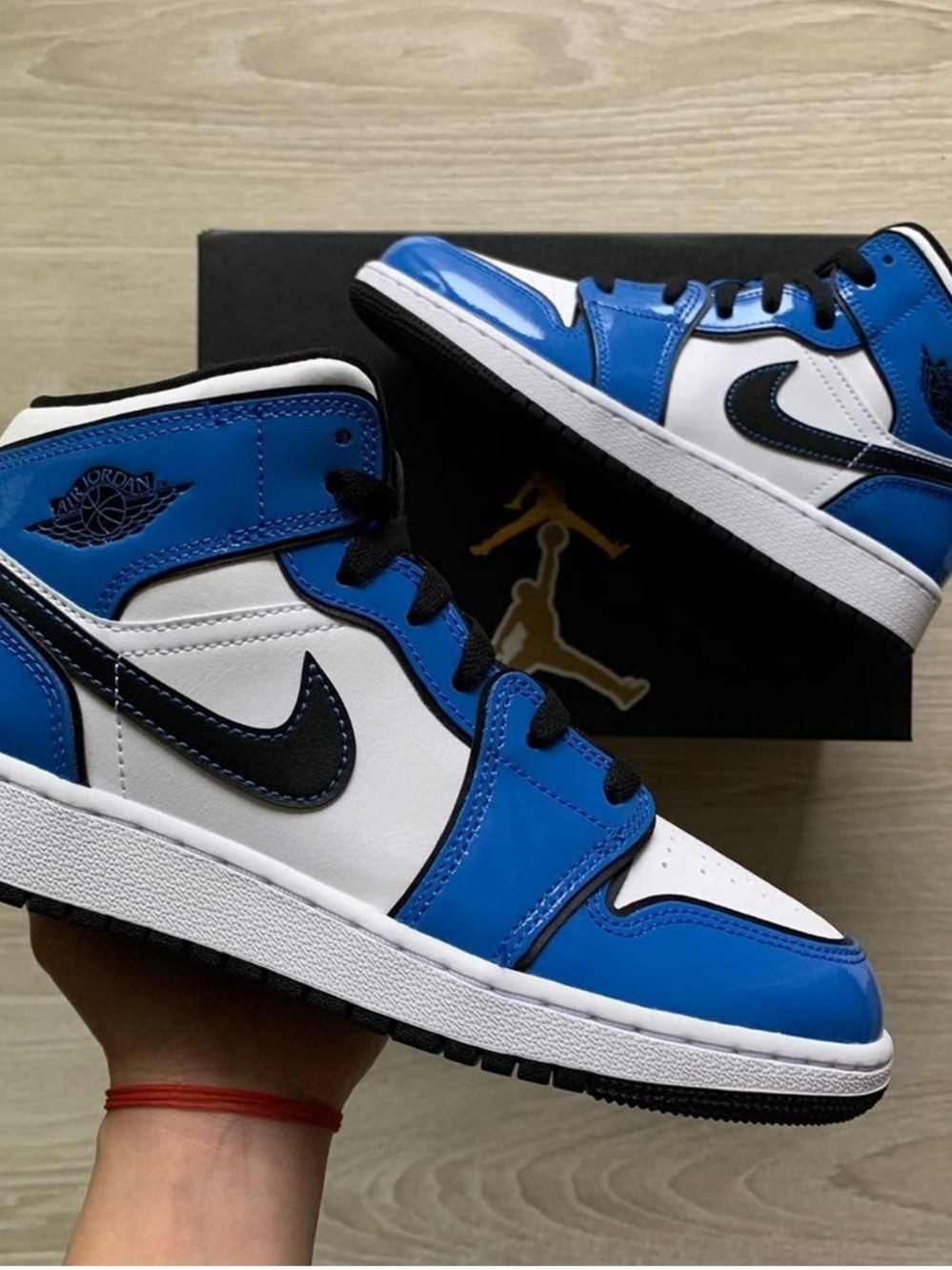 Nike Air Jordan 1 Mid SE (Black, Blue, and White High-Tops)